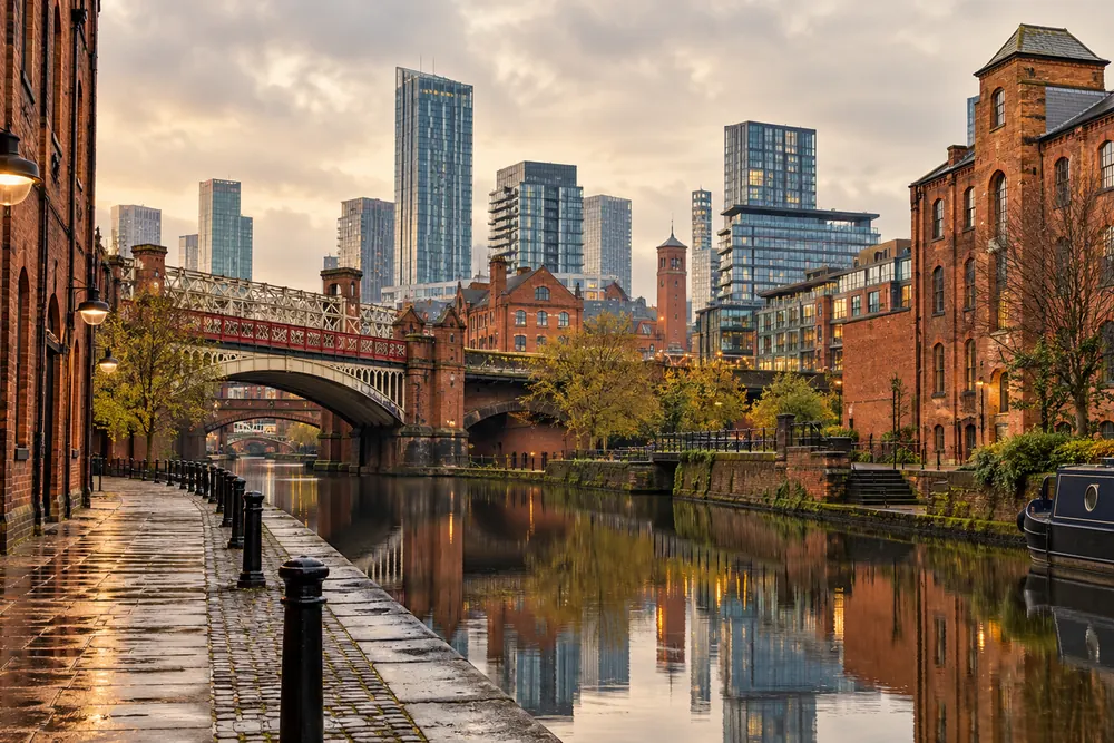 Red brick canal-side commercial architecture in Manchester